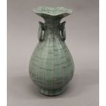 A Chinese celadon vase. 19 cm high.