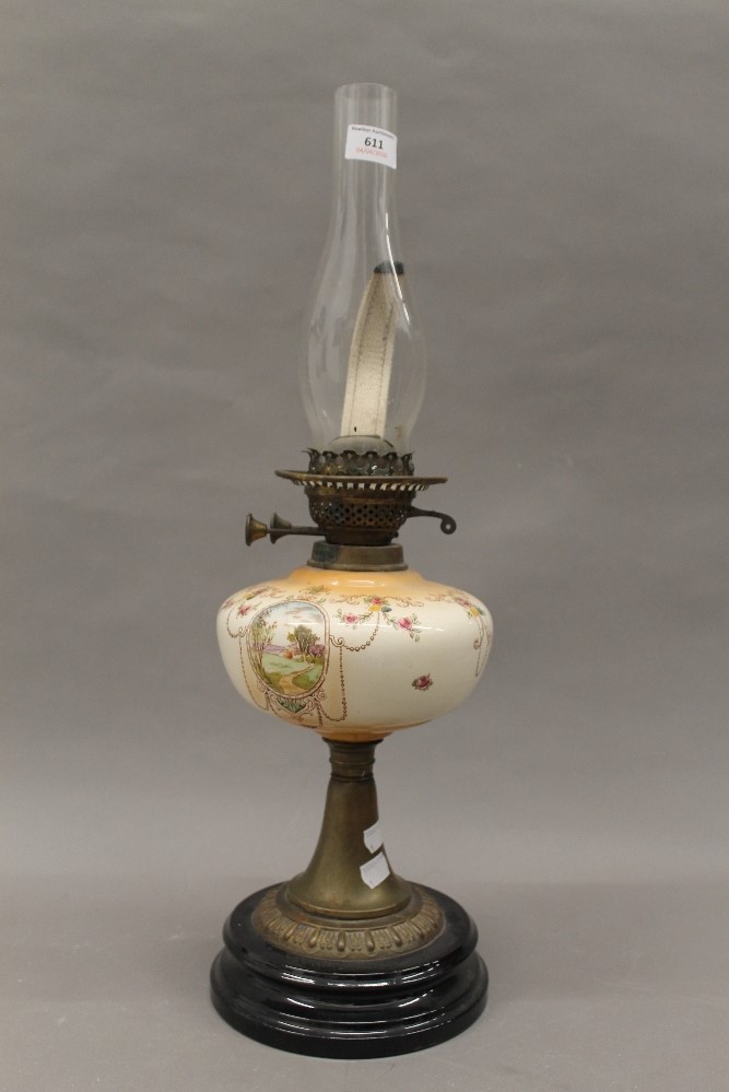 A Victorian oil lamp. 60 cm high.