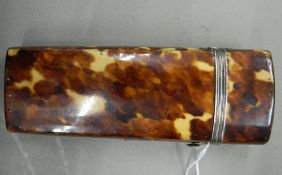 A 19th century tortoiseshell etui containing a maths compass and ruler. 11 cm long.