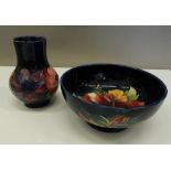 A Moorcroft bowl and a Moorcroft vase. The vase 12 cm high.