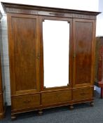 An Edwardian mahogany three door mirrored wardrobe. 200 cm wide.