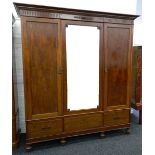 An Edwardian mahogany three door mirrored wardrobe. 200 cm wide.