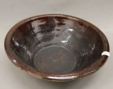 A large ceramic dairy bowl. 47 cm diameter.