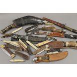 A quantity of various pocket knives and sheath knives, etc.