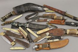 A quantity of various pocket knives and sheath knives, etc.