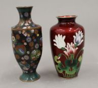 A Japanese red ground cloisonne vase brightly decorated with flowers and a 19th century Japanese