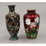 A Japanese red ground cloisonne vase brightly decorated with flowers and a 19th century Japanese