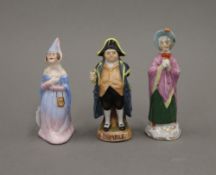 Three small porcelain figures. The largest 10 cm high.