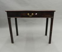 A Georgian mahogany side table. 89 cm wide.