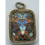 A silver gilt and enamel pendant. 3.75 cm high.