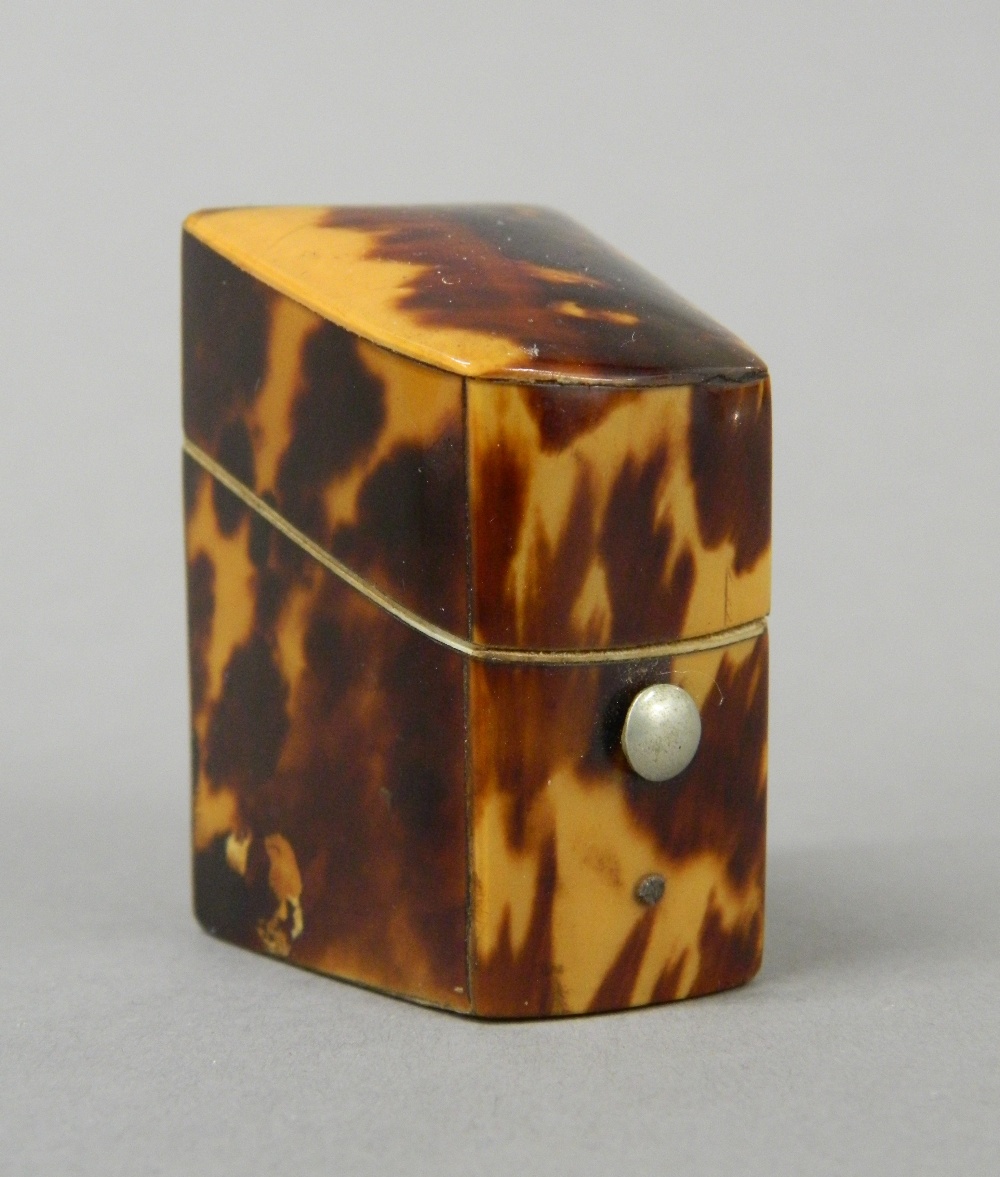 A Victorian tortoiseshell thimble box, with silver thimble. 4.75 cm high.