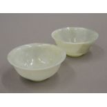 A pair of Chinese jade bowls. 7.5 cm diameter.