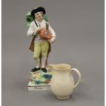 A rare late 18th century Creamware sparrow beak jug and a square based Walton type figure of a male