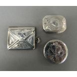 A small silver stamp case, a vinaigrette and a patch box.