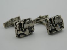 A pair of 1970s silver cufflinks