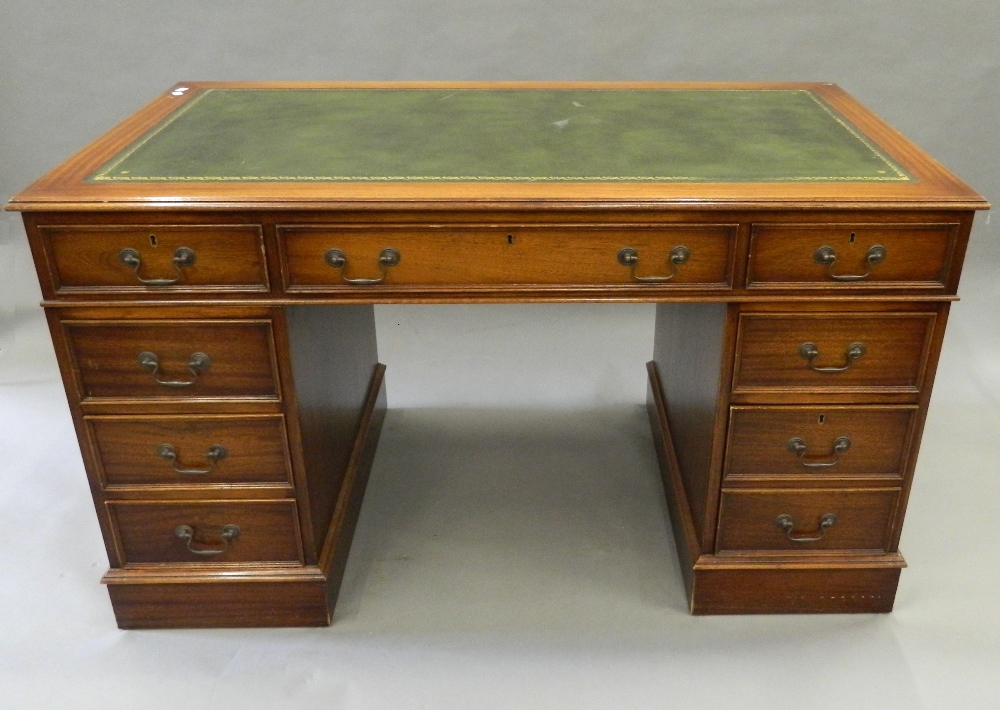 A modern pedestal desk. 136 cm wide.