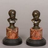 A pair of 19th century French patinated bronze busts, modelled as Jean Qui Rit and Jean Qui Pleure,