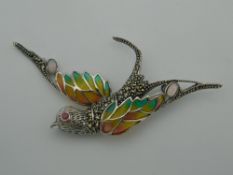 A silver plique a jour bird brooch. 7.5 cm wide.