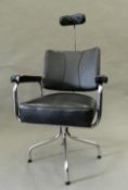 A vintage dentist's/barber's chair. 64 cm wide.