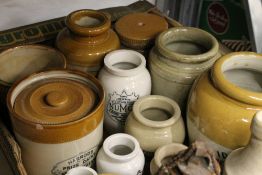 A collection of various Victorian stoneware storage jars