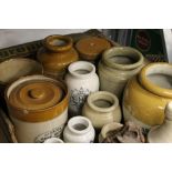 A collection of various Victorian stoneware storage jars