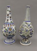 Two 19th century Persian Qajar pottery vases, brightly decorated with floral designs and a deer.