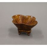 A Chinese pottery censer of quatrefoil form. 10 cm wide.