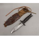 An American K-Bor knife, in sheath. 26 cm long.