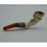 A small Meerschaum pipe formed as a hoof. 6.5 cm long.