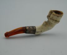 A small Meerschaum pipe formed as a hoof. 6.5 cm long.