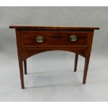 A Georgian inlaid mahogany single drawer side table. 99 cm wide.