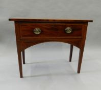 A Georgian inlaid mahogany single drawer side table. 99 cm wide.