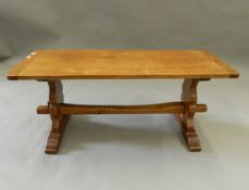 An oak coffee table. 102 cm long.