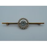 A 15 ct gold aquamarine and pearl bar brooch. 5.75 cm long (4.