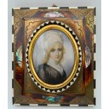A fine 19th century miniature on ivory of a girl in an ornate frame,