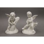 A pair of Dresden porcelain cherubs. The largest 13 cm high.