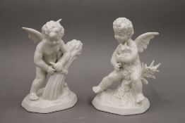 A pair of Dresden porcelain cherubs. The largest 13 cm high.