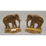 A vintage pair of oxidized brass elephant bookends. 14 cm high.