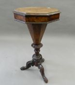 A Victorian burr walnut octagonal trumpet worktable. 43.5 cm wide.