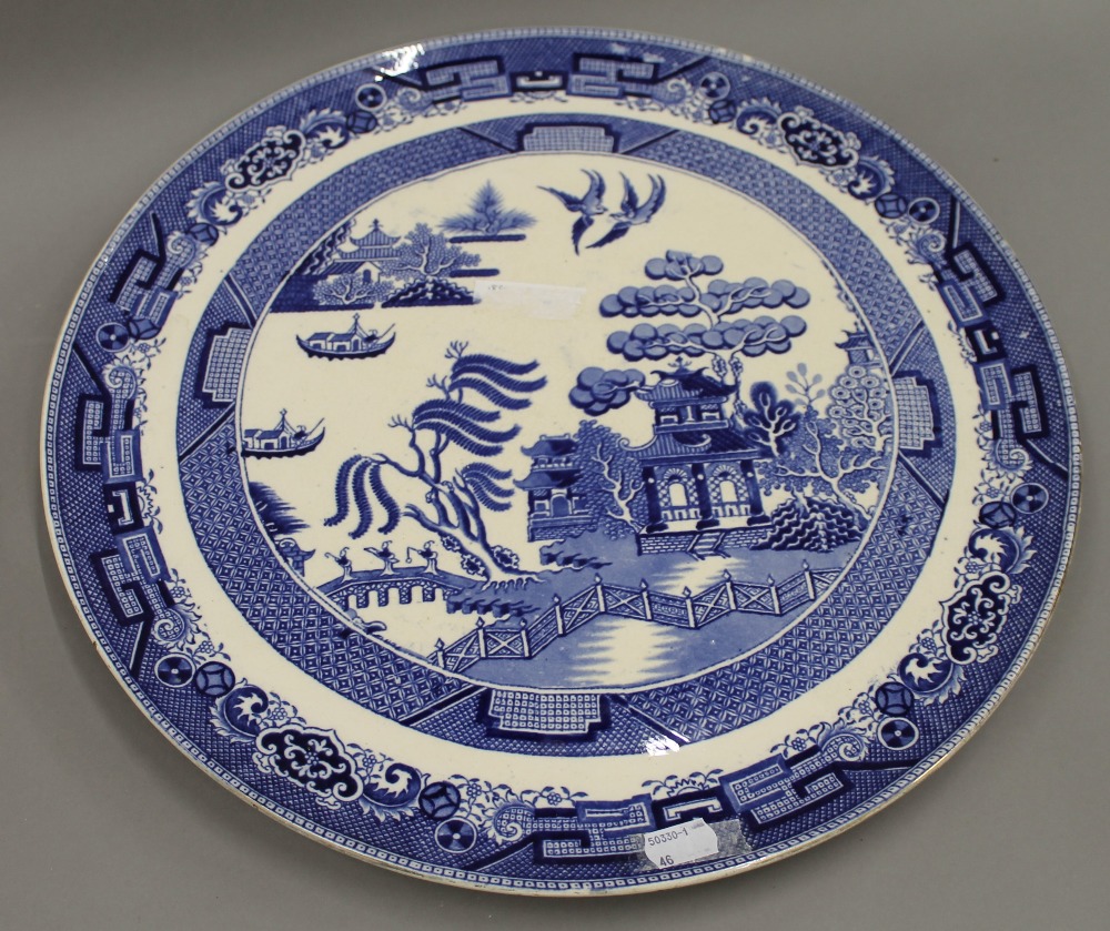 A Victorian Caius College sewing dish and two large Willow pattern plates. The former 30 cm wide. - Image 6 of 7