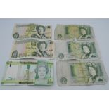 Six £1 notes (three UK and three Jersey)
