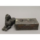 A model sphinx and a Chinese box. The former 17 cm long.