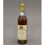 A single bottle of French Pure Grape Brandy