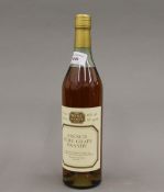 A single bottle of French Pure Grape Brandy