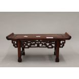 A Chinese carved wooden model of an alter table. 37.5 cm wide.