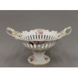 A 19th century florally decorated porcelain tazza, probably Ridgway. 36 cm wide.