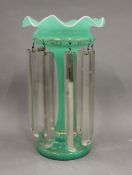 A Victorian green glass lustre. 28 cm high.