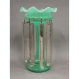 A Victorian green glass lustre. 28 cm high.