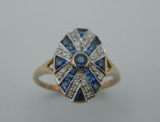 An Art Deco style 9 ct gold diamond and sapphire oval ring. Ring size O.