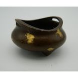 A Chinese miniature gold splash bronze censer. 4.5 cm wide.